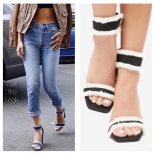 Black vegan suede stiletto heels with faux fur accents